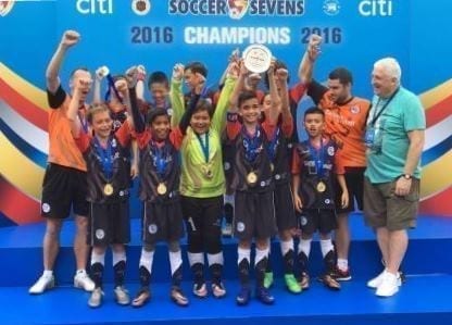 ESF Lions U11 Team Wins Plate with Legendary Football Player David Johnson!