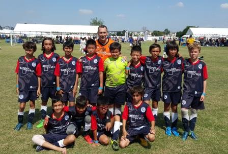ESF Lions under 11 Premiership Boys team wearing kit sponsored by our firm