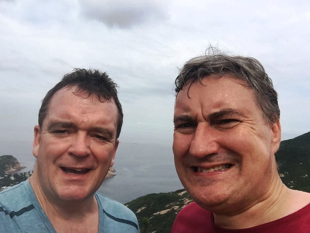 FraudNet members Jeff Lane and Stephen Baker enjoying a very hot hike along Dragon’s Back on Hong Kong Island