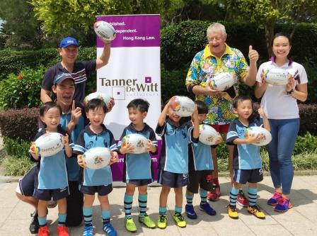 Jim Leung (Chairman of the Minis), Mark Side and Natalie Lam with the Hong Kong Monkeys and their coach