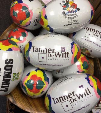 Tanner De Witt mini rugby balls